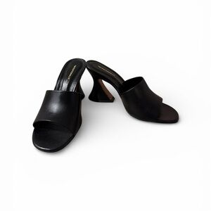 INTENTIONALLY BLANK Black Mules